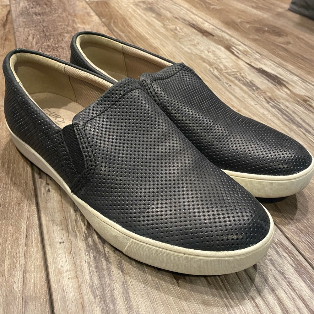 Black perforated leather slip-on sneaker